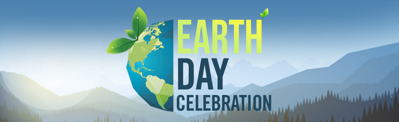 The words "Earth Day" in front of an image of the globe with a mountain backdrop